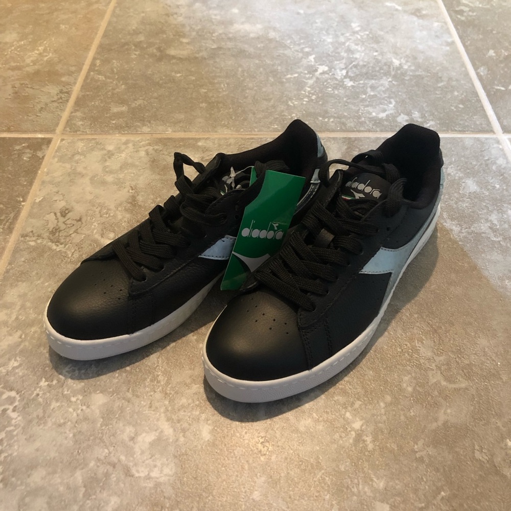 New, black sneakers. Size 7.